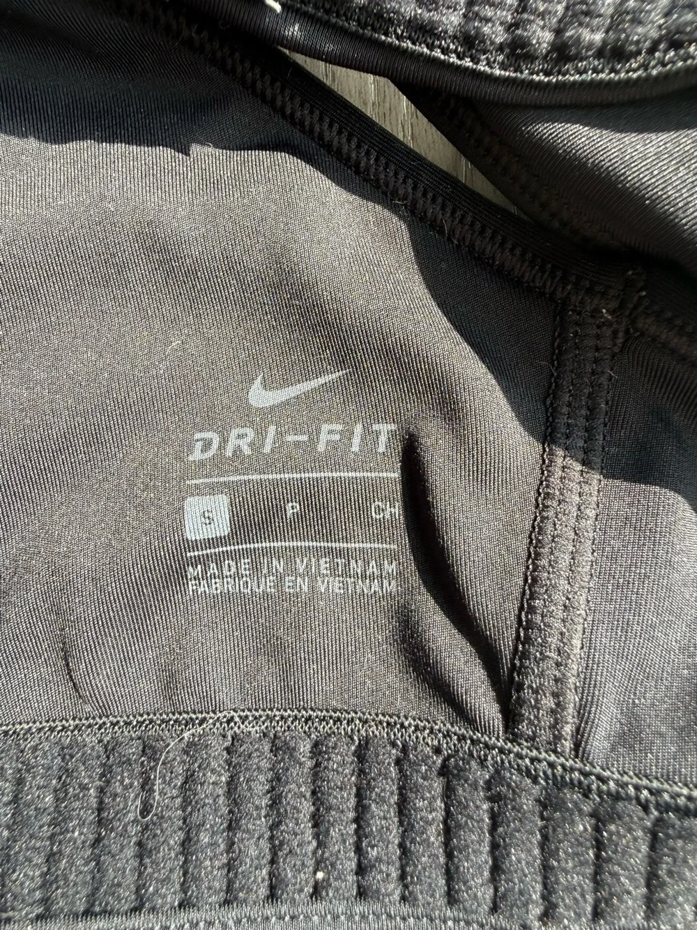 EUC Nike Black Racerback Sports Bra with White Swoosh